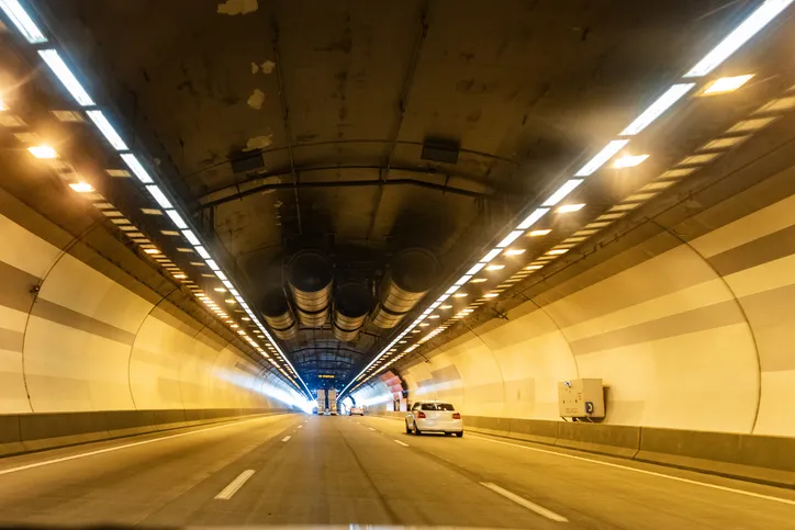 Fleet vehicle driving through a tunnel